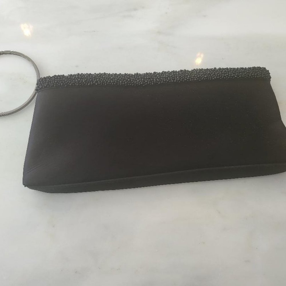 La Regale black satin wristlet evening bag.